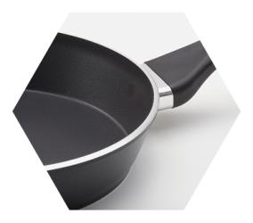 close up of black nonstick cooking pan on white background